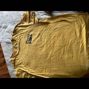 Yellow Coors Light T. Light material with a nice design on the back. Large